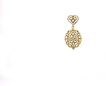 在白色背景下美丽的复古东方金土耳其首饰女性耳环