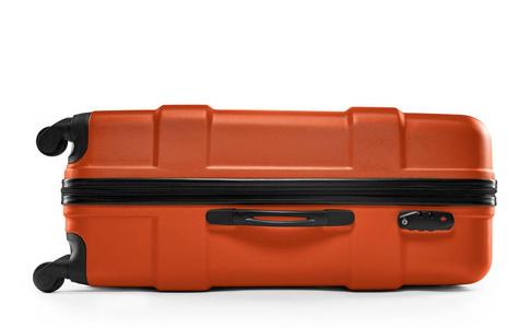 橘黄色的手提箱。平躺着