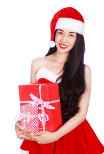 快乐的女人在圣诞老人的衣服与礼品盒隔离
