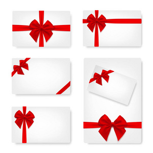 一套白色的纸卡与礼品红缎弓。股票载体
