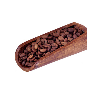 白底木铲的咖啡豆