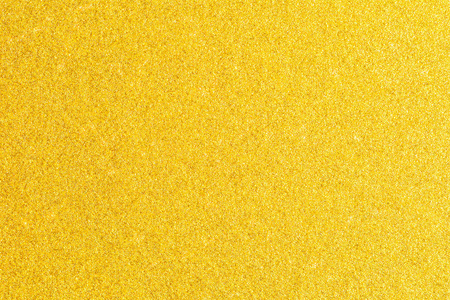 闪亮的金箔。黄色 metallik 纹理背景。金色闪光纹理背景