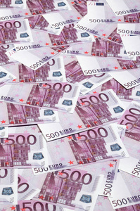 由紫色500欧元组成的货币背景遍布屏幕。 财富象征纹理照片