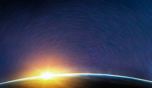 从太空看地球日出和星迹景观