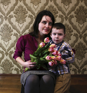 s day and gives her a bouquet of beautiful tulips