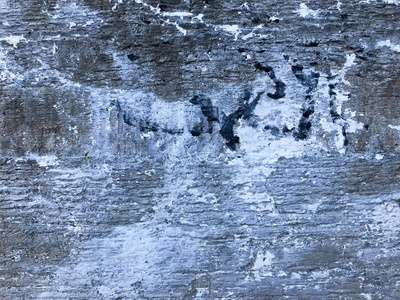 老灰混凝土水泥灰泥墙的纹理有裂缝凹痕图案和离婚分离片的背景。