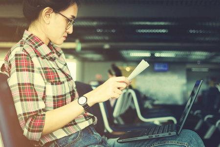 business travellers waiting for their flight at airpor