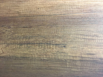 木材纹理背景轻风化乡村橡木。 褪色的木漆，显示木纹纹理。 硬木洗过的木板图案桌面