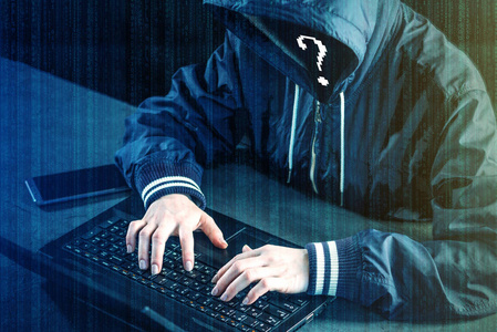 匿名黑客程序员使用笔记本电脑黑客系统。 偷个人资料。 恶意病毒的产生和感染。 网络犯罪和黑客电子设备的概念