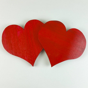 s wooden red heart on white background  top view