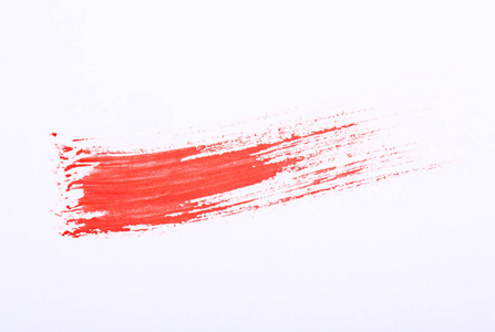 红色标记油漆纹理隔离在白色背景上。 红色油漆笔画。 彩色水彩颜料的图案纹理。 古瓦奇。 抽象。