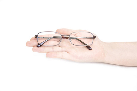 s hand holding glasse on white background. Glasses in hand. Isol