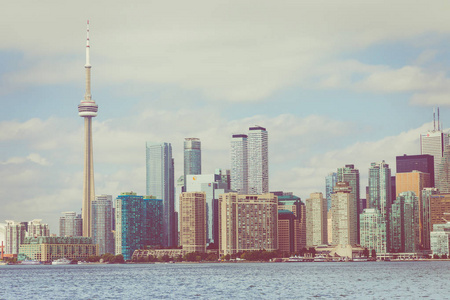 s skyline over lake. Toronto, Ontario, Canada.