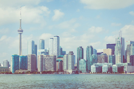 s skyline over lake. Toronto, Ontario, Canada.