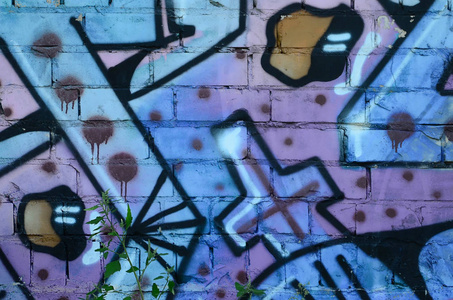 涂鸦图纸的碎片。 在街道艺术文化的风格中，用油漆污渍装饰的旧墙。 冷色调的彩色背景纹理。