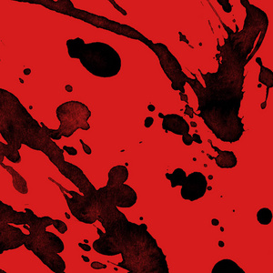 抽象黑色油漆飞溅纹理在红色背景上