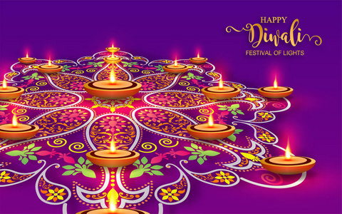 快乐的diwali节日卡与黄金diya图案和水晶纸上的颜色背景.照片