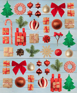 圣诞节或新年背景红色和金色玻璃球，冷杉树枝，装饰品和木制背景上的礼物。 一个祝贺你的地方。