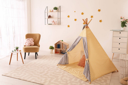 s room interior with play tent and toys