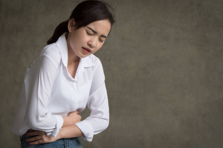  sick woman suffering from stomachache, menstrual period cramp, 