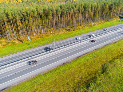 s eye photo of highway. Expressway. Road junctions. Car passing.