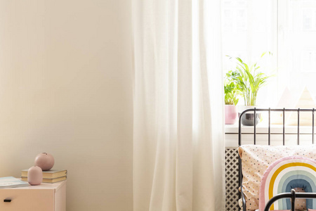 s bedroom interior with plants and copy space on the wall. Real 