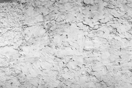 旧粗糙的白色混凝土墙背景