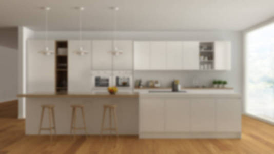 模糊背景室内设计，现代简约白色木制厨房与岛屿和大全景窗镶花吊灯，当代建筑。
