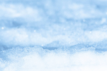 抽象的闪亮的雪背景。 新鲜雪抽象纹理背景