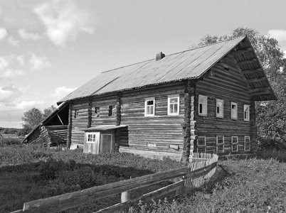 s wooden house in northern russian village Haluy. Monochrome sty