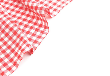 白色背景上的红色野餐巾，格子的午睡框架。京汉布空空间背景..