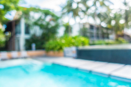 抽象模糊和分散美丽的室外游泳池在酒店和度假村的背景。