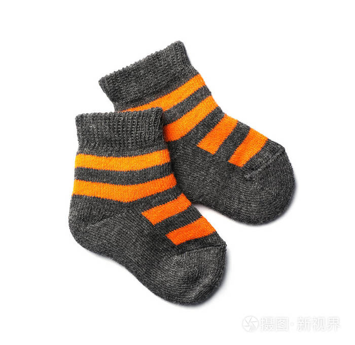 可爱的儿童袜子白色背景顶部视图