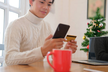  smart phone for online shopping.  male buyer buying christmas g