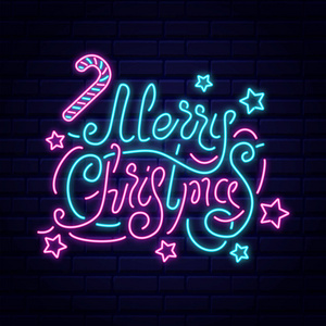 圣诞快乐矢量插图。 砖墙背景上的霓虹灯刻字。 粉红色和蓝色