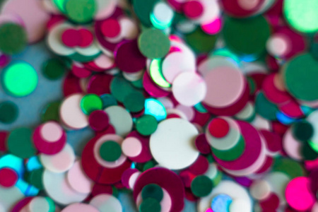 s party at night. Colorful bokeh background. Glitter blurry ligh