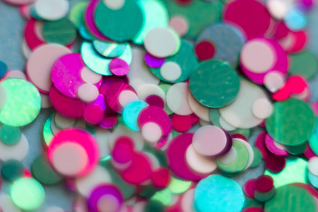 s party at night. Colorful bokeh background. Glitter blurry ligh