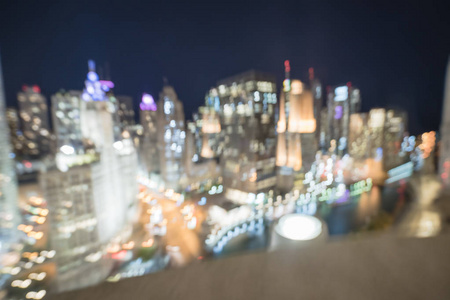 抽象模糊离焦的芝加哥滨江写字楼及住宅楼高层..从明亮的天际线俯瞰城市夜景