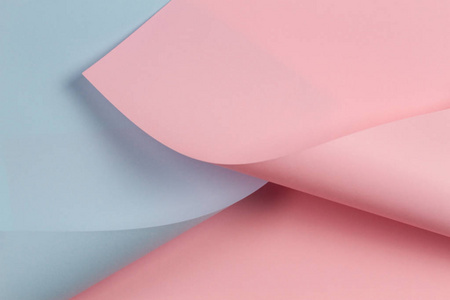 抽象几何形状柔和的粉红色和蓝色的纸背景