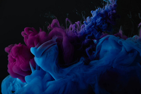 带有蓝色和紫色漩涡的抽象深色纹理