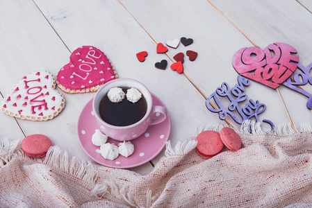 s day breakfast. Delicious coffee and cookies on a wooden table.