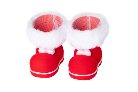 圣诞装饰品。 一双红色圣诞靴或圣诞老人靴子隔离在白色背景上。