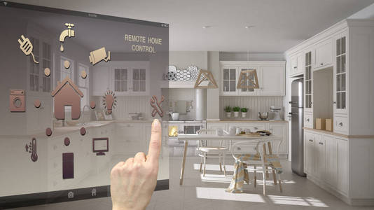 智能家居控制概念手控制数字接口从移动应用程序。 背景显示斯堪的纳维亚经典厨房与餐桌椅建筑室内设计