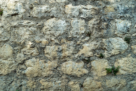 砌体。 旧石头的墙。