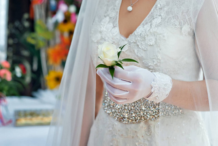 s hands on the background of the dress.