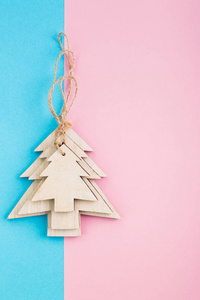 s Day festive decoration, wooden Christmas trees on blue and pin