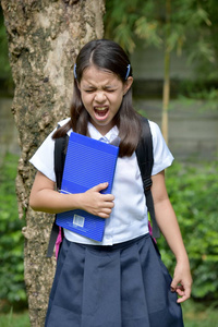 焦虑不安的女学生穿着校服图片