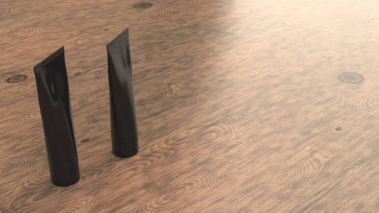 空白的黑色牙膏奶油或凝胶的配对，站在木制背景上。品牌模型。3D绘图说明