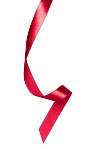 闪亮的缎带红色隔离在白色背景关闭。 装饰设计用丝带图像。