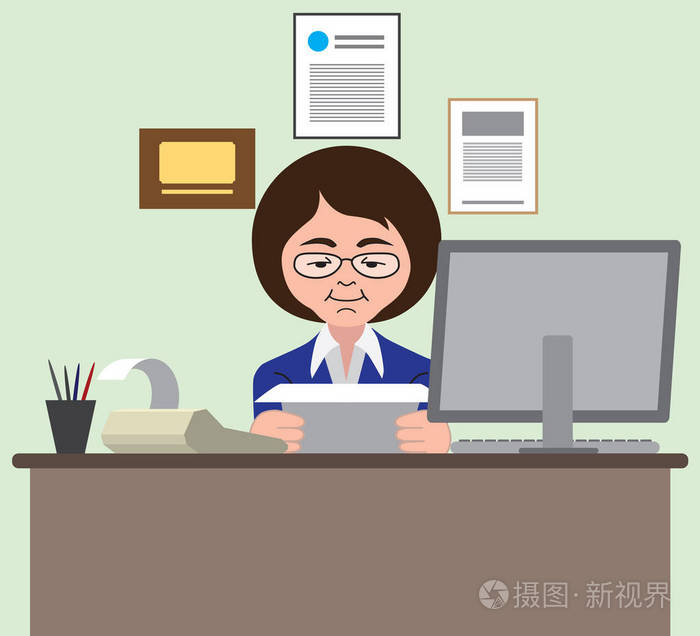 一位忙碌的女会计师正在研究一些文件